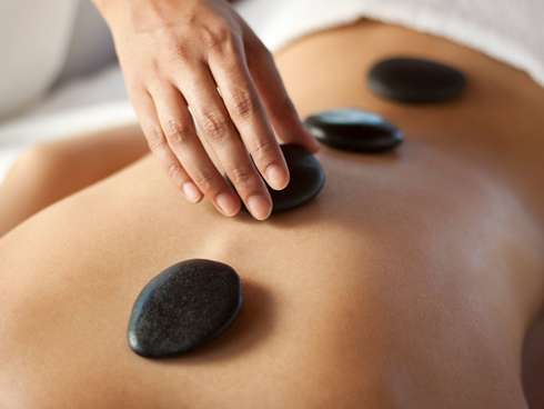 Image de la prestation LE MASSAGE AUX PIERRES CHAUDES en duo AVEC SPA